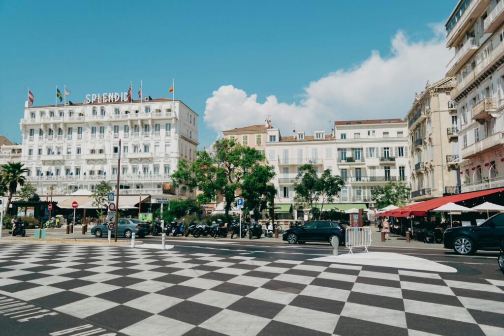 pexels-photo-32457923-32457923 Elegant street view of Cannes with historic architecture and vibrant atmosphere.